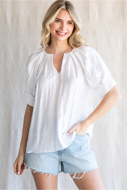 Slightly glossy top with short puffed french sleeves- Off White