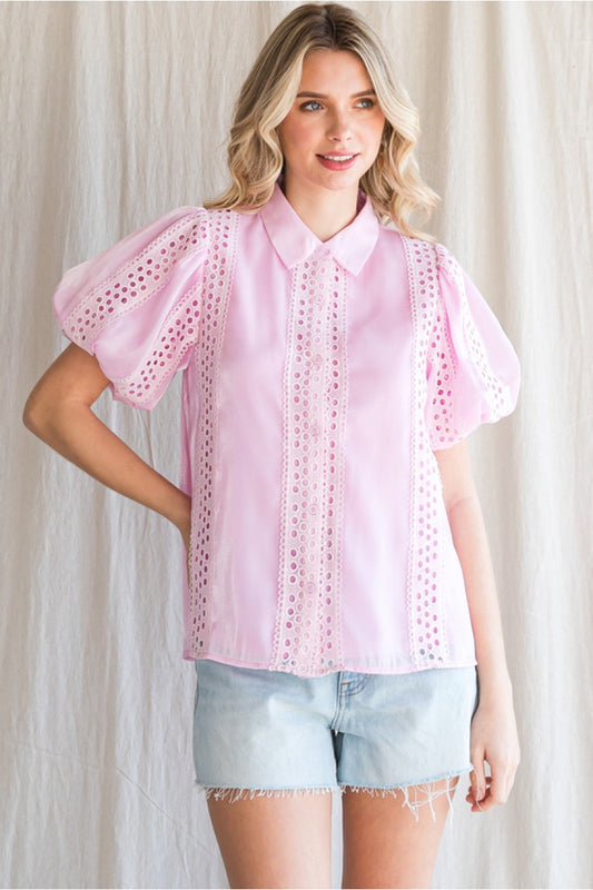 Glossy solid button-up top with a collard neck, short puffed sleeves, and lace trim detail