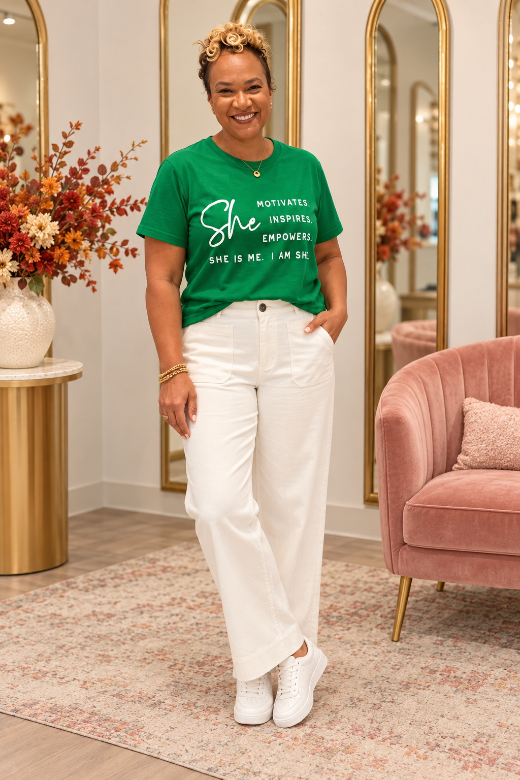 She Motivates Graphic Tee