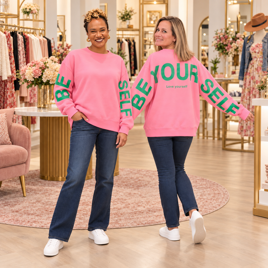 Tiffany and Mandi model the pink Be Yourself sweatshirt, front and back views